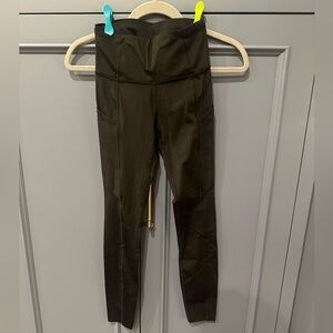 Lululemon black leggings with side pockets. Size 2.